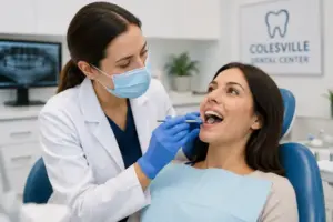 Dentist examining a patient for tooth sensitivity